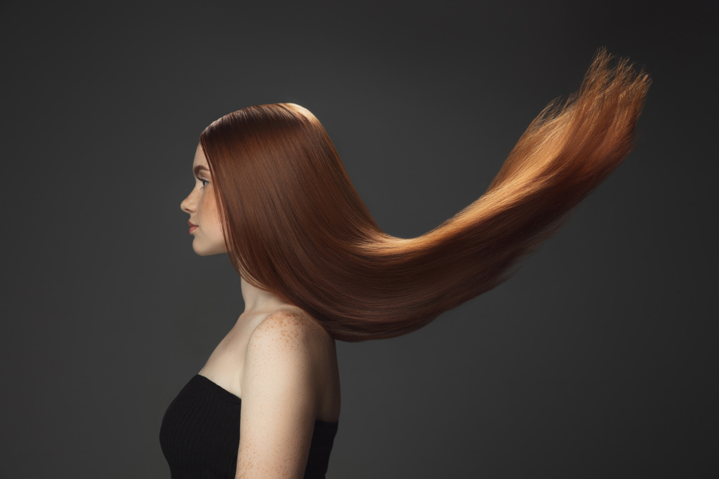beautiful_model_with_long_smooth_flying_red_hair_isolated_dark.jpg beautiful_model_with_long_smooth_flying_red_hair_isolated_dark.jpg